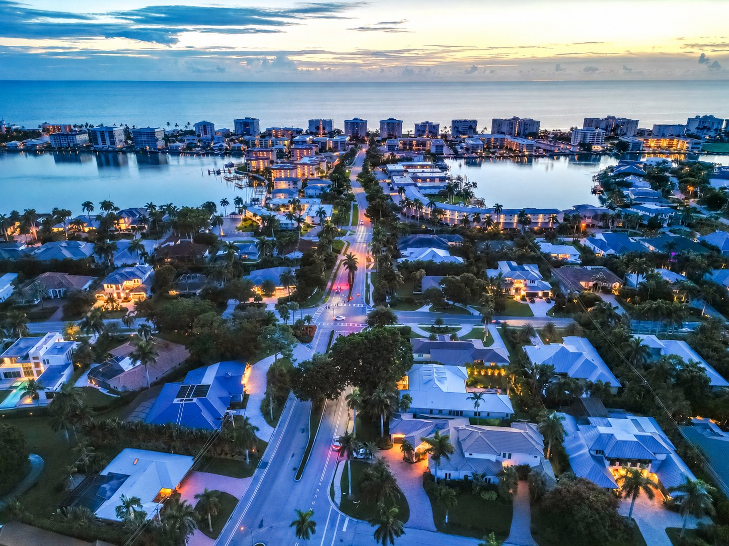 The Moorings at dusk from the air, looking west across Moorings Bay to the Gulf of Mexico